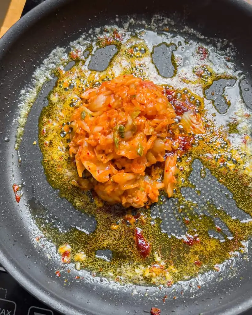 Kimchi fully cooked in the pan - GENIUS EATS Kimchi fully cooked in the pan