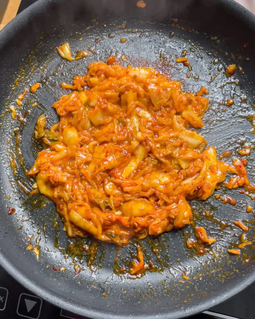 Thickened creamy kimchi sauce in the pan - GENIUS EATS Thickened creamy kimchi sauce in the pan