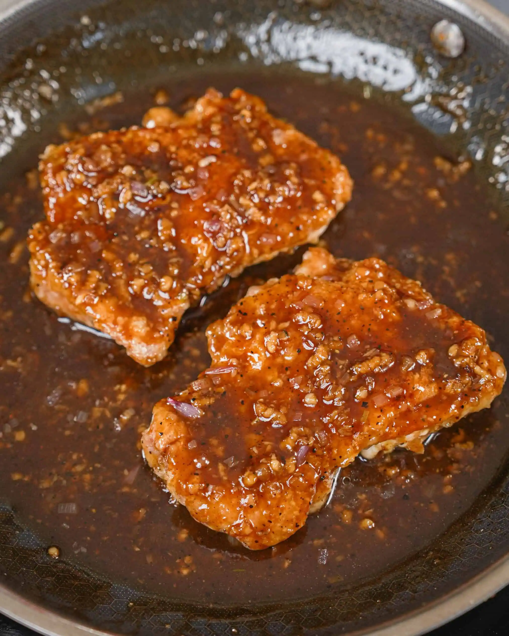 Crispy chicken cutlet simmered in a rich garlic soy glaze. - GENIUS EATS Black pepper sauce chicken