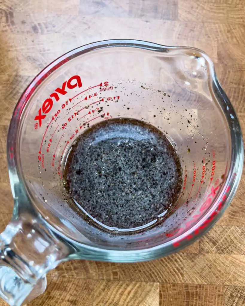 Pre-mixed black pepper sauce in a Pyrex measuring cup - GENIUS EATS Pre-mixed black pepper sauce in a Pyrex measuring cup