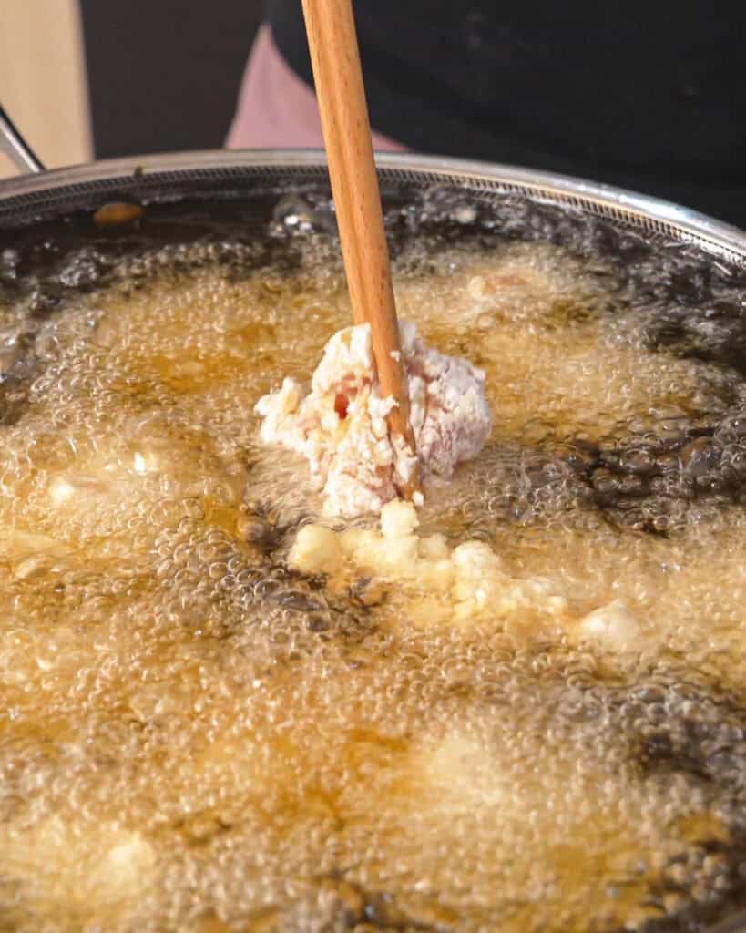 Chicken karaage pieces coated generously in potato starch - GENIUS EATS Chicken karaage pieces coated generously in potato starch