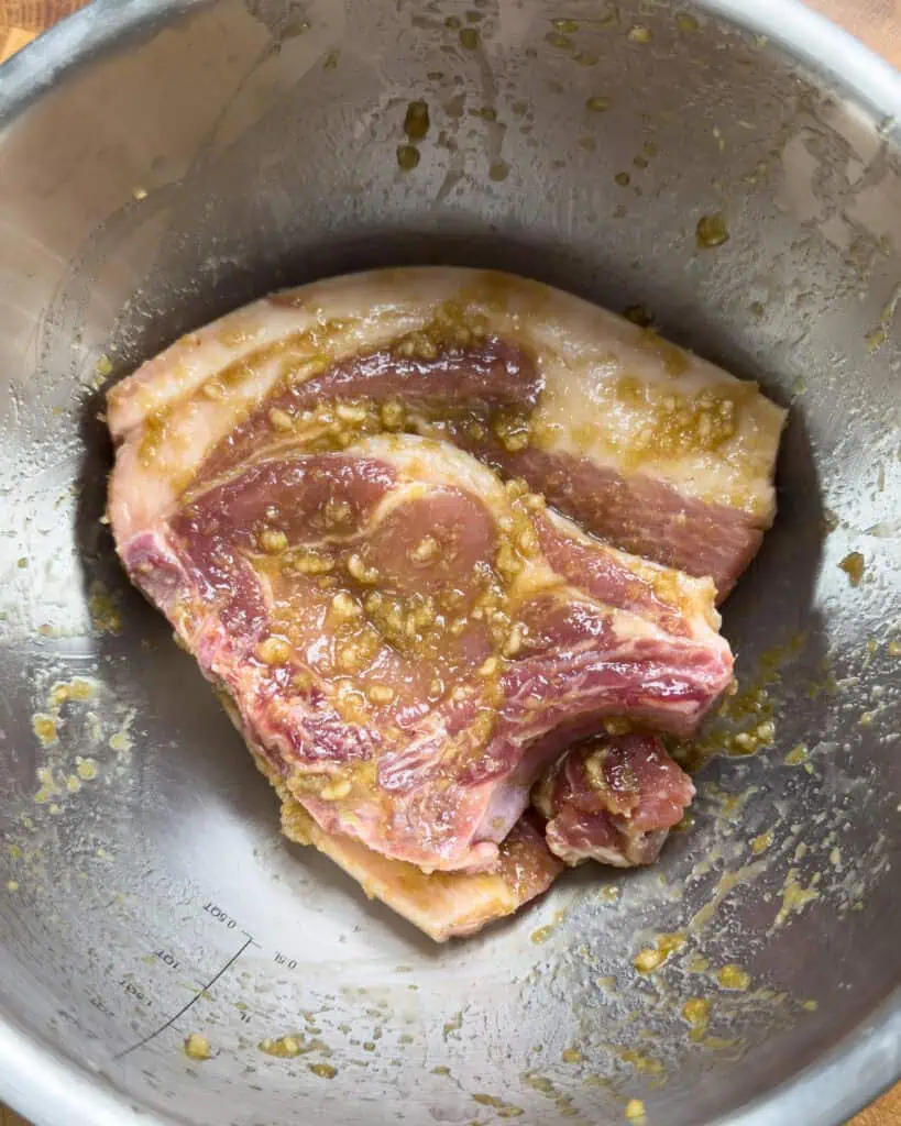 Pork chops marinating in lemongrass garlic fish sauce marinade - GENIUS EATS Pork chops marinating in lemongrass garlic fish sauce marinade