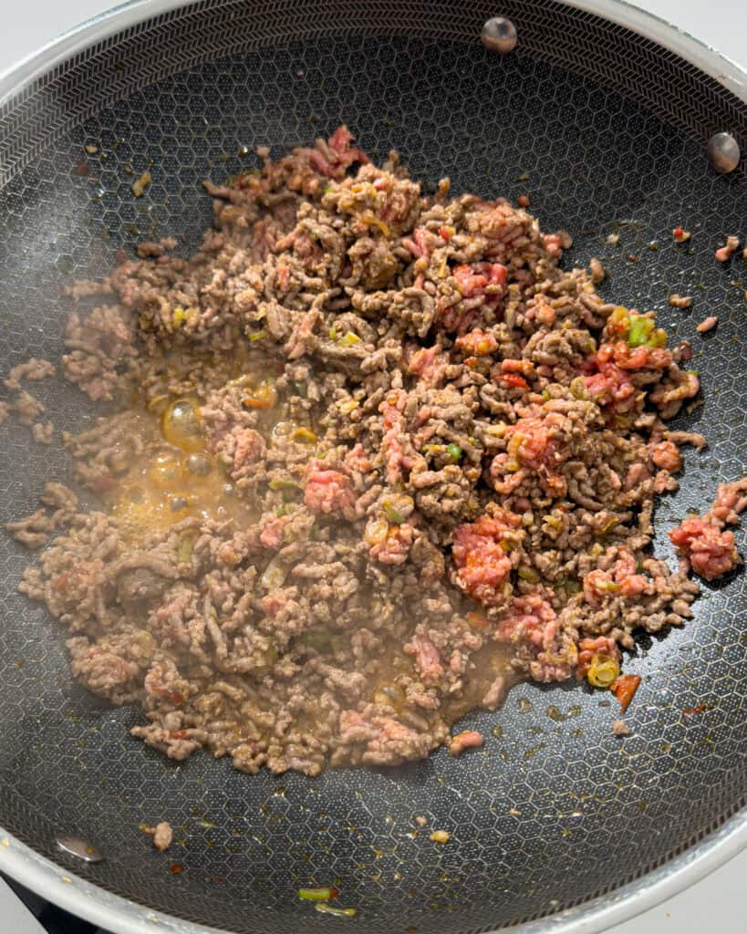 Minced pork cooking in a pan