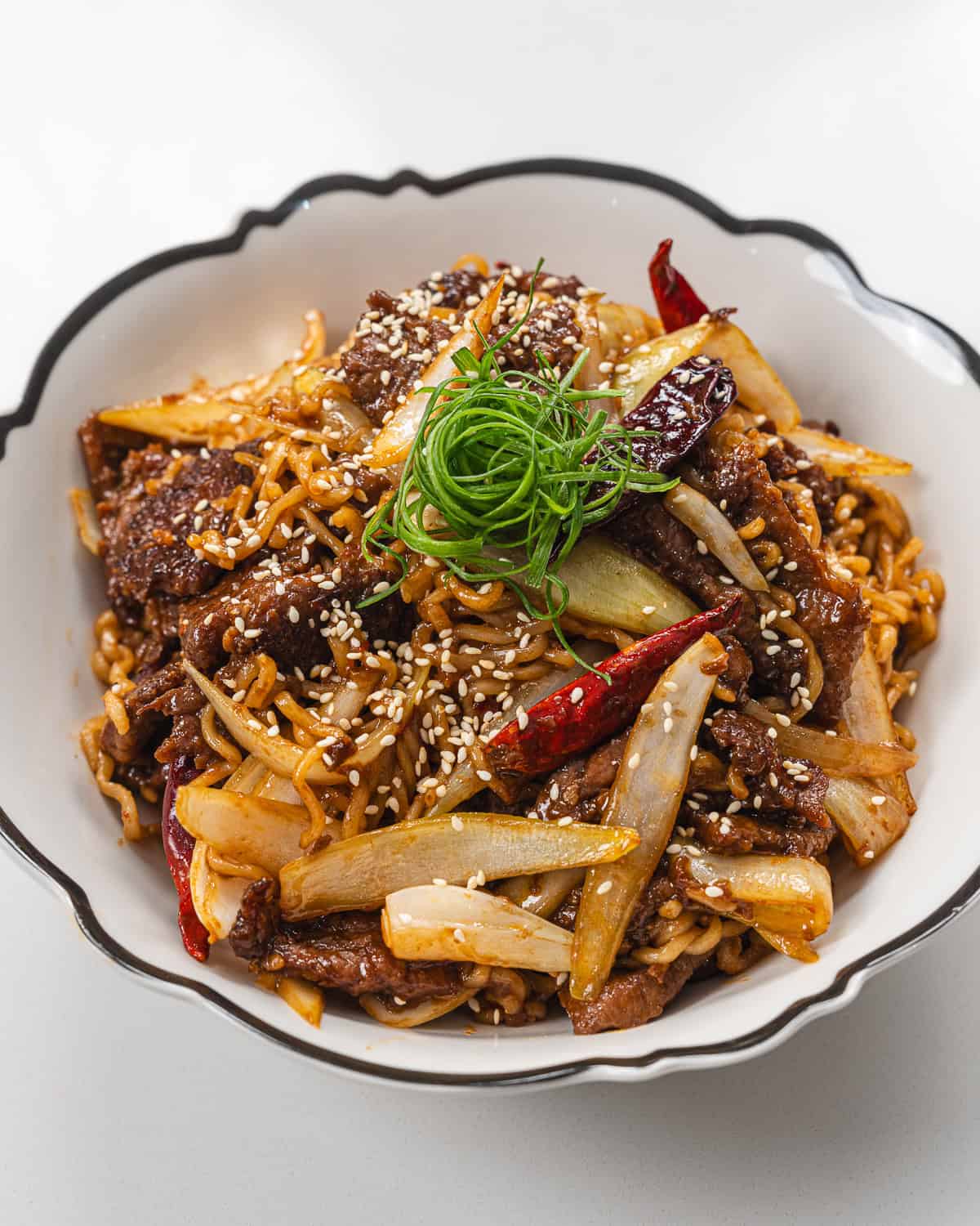 Delicious Asian beef stir-fry with vegetables and sesame seeds. Perfect for a quick, flavorful meal.