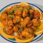 Orange Chicken with Fresh Citrus Garnish.