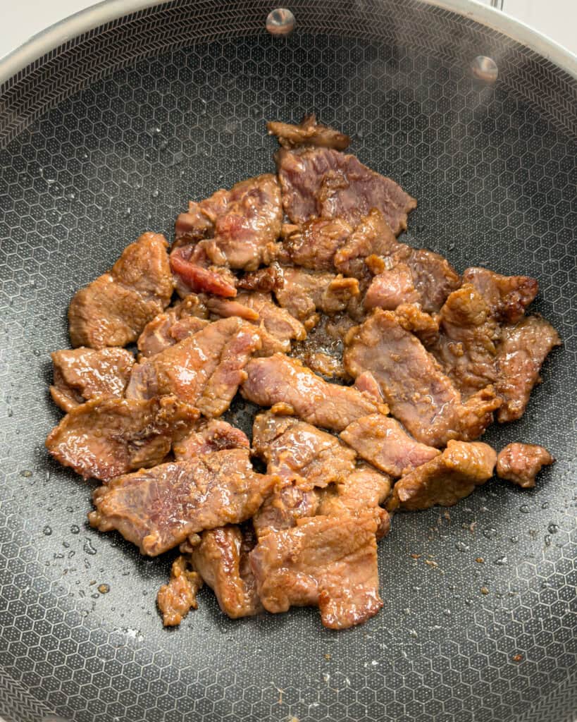Raw sliced beef prepared for velveting in Mongolian Beef Noodles recipe