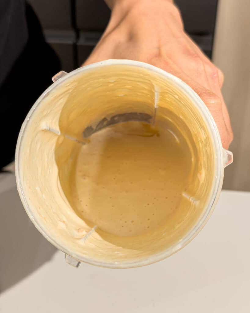 Smooth blended tofu cream inside blender cup for Mapo Tofu Udon sauce