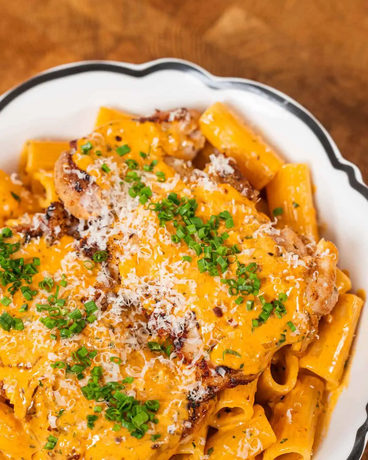 A bowl of creamy gochujang chicken alfredo pasta - GENIUS EATS A bowl of creamy gochujang chicken alfredo pasta