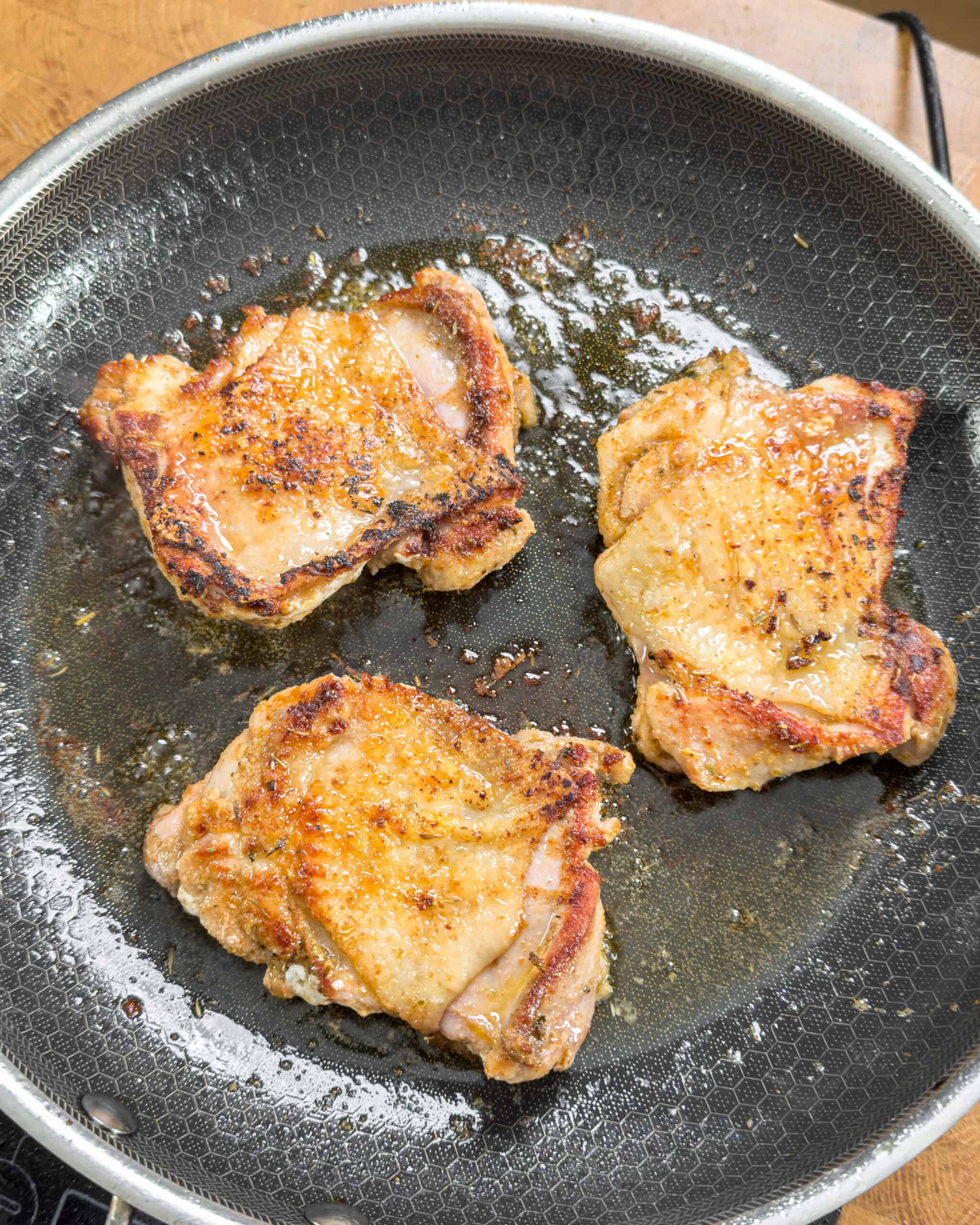Chicken thighs pan fried until golden brown - GENIUS EATS Chicken thighs pan fried until golden brown