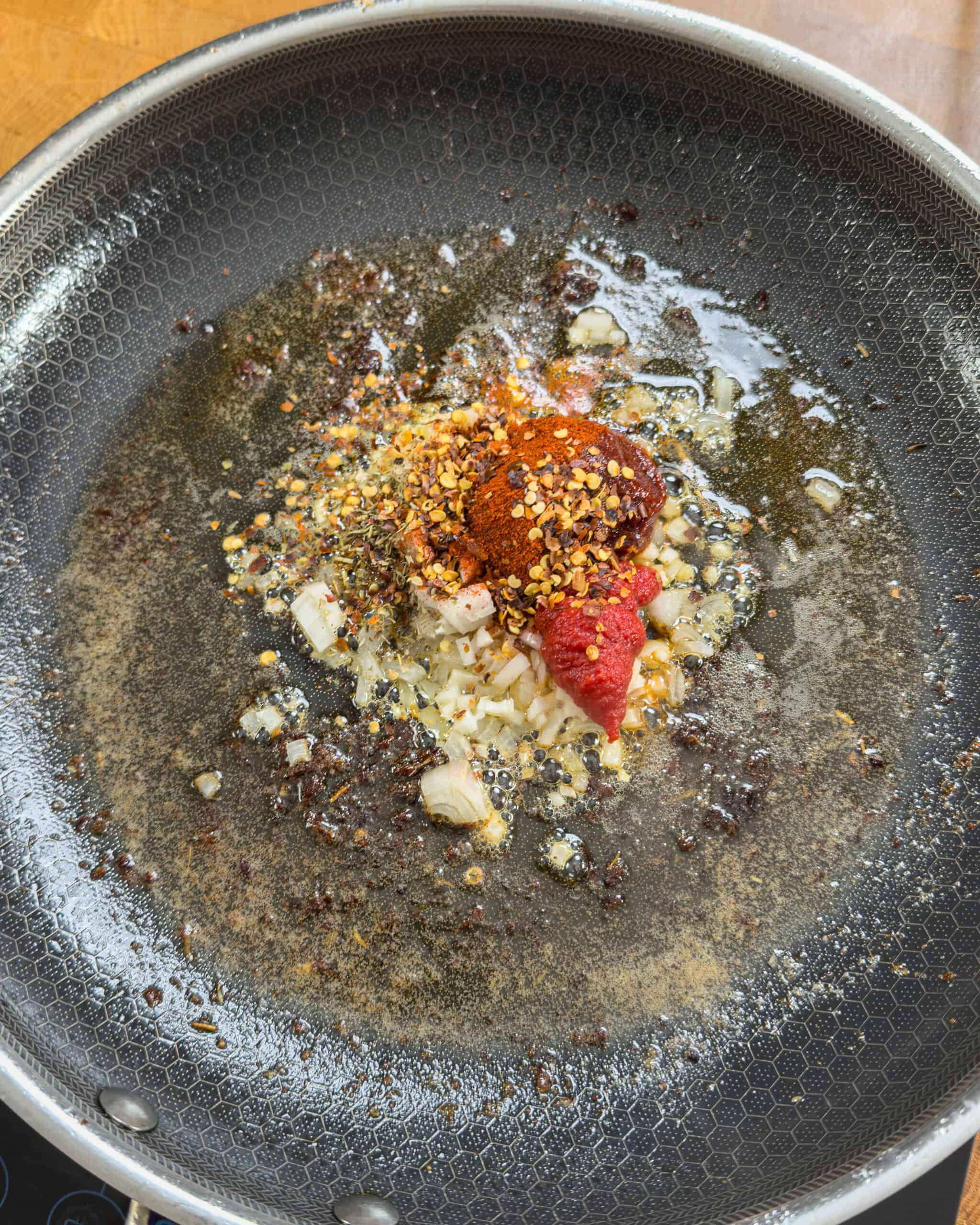 Sauteing shallot, garlic and gochujang in butter - GENIUS EATS Sauteing shallot, garlic and gochujang in butter